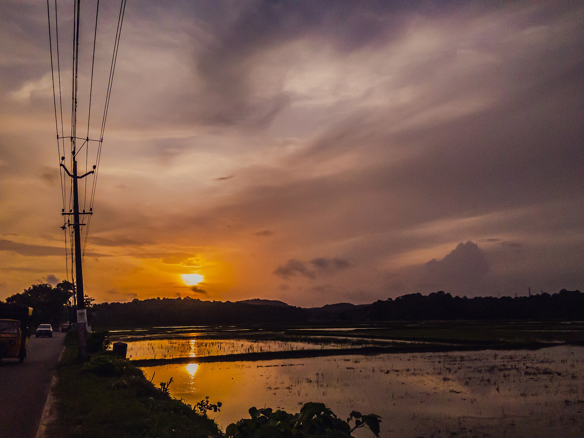 Golden Hour Reflections at Thirumatticod, Palakkad — photograph by Navaneethpp